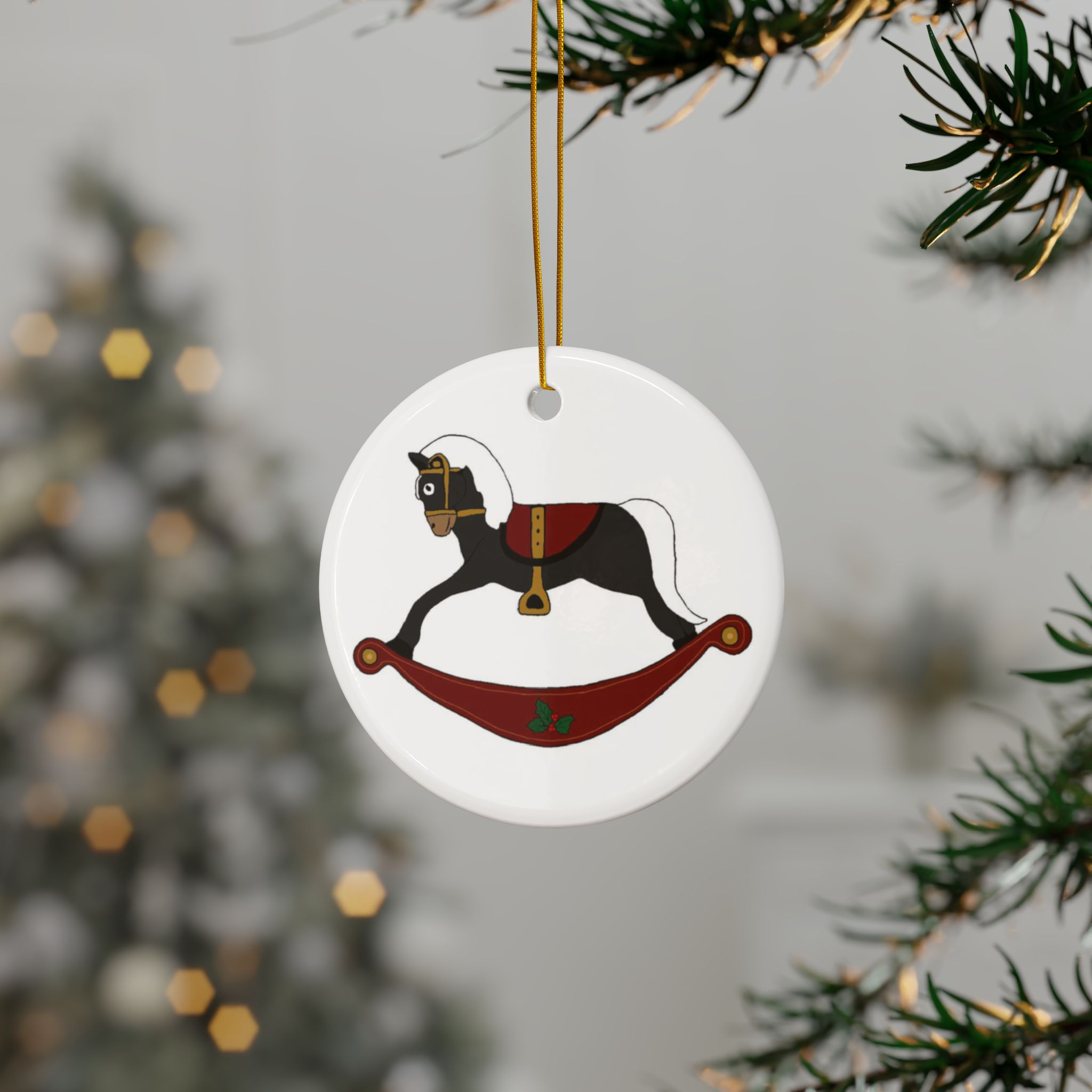 Black rocking horse Christmas ornament with red saddle.