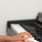 Boy Playing Synthesizer