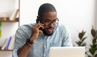 Serious african-american employee making