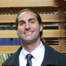 Justin J Spees