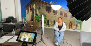 Woman in studio recording YouTube Short for Viator
