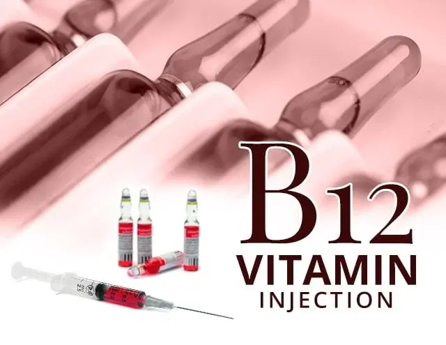 Red ampoules and syringe on a white background, with "B12 VITAMIN INJECTION" text, emphasizing a medical theme.