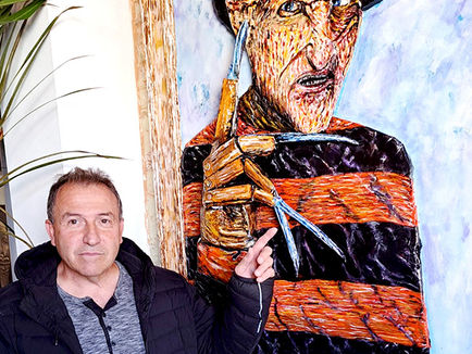 Halloween themed art show draws large audience to local business