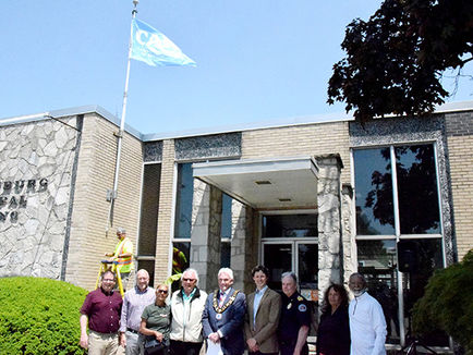 Seniors Month Flag raised at town hall