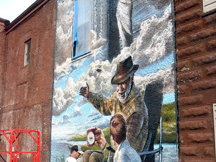 New mural in "Art Alley" in time for this weekend's Art Crawl