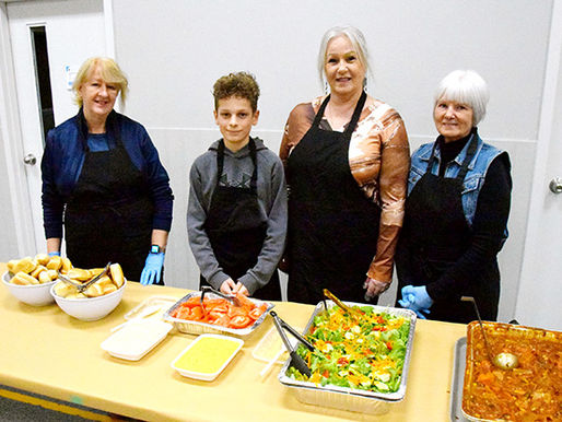 Community dinners resume at new location