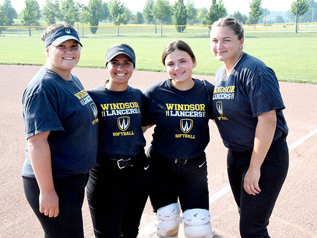 Four members of the University of Windsor women’s softball team are from Amherstburg. They are (from left) Jennifer Dufour, Soleen DePape, Jacqueline Pento and Allison Dufour. The team is holding a fish fry at the Columbus Community Hall in Amherstburg this Friday from 4:30-6:30 p.m.