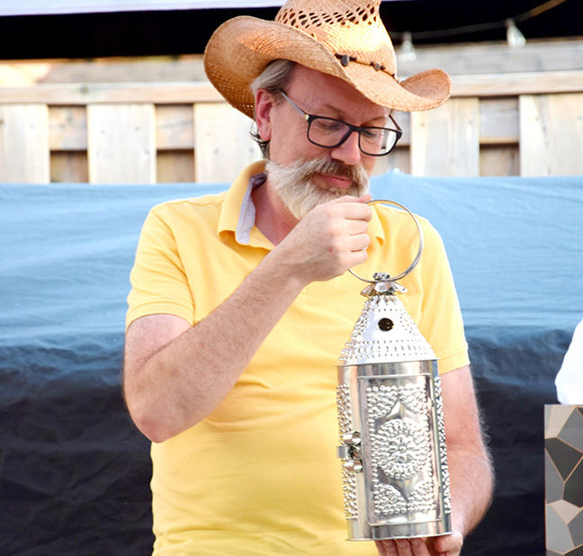 Past president and treasurer Jeremy Warnock was recognized with a tin lantern from the Park House Museum for his year as president.