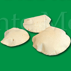 Three handmade corn tortillas