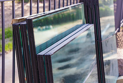 New sealed glass units at building site. Storage and preparation at the installation of wi