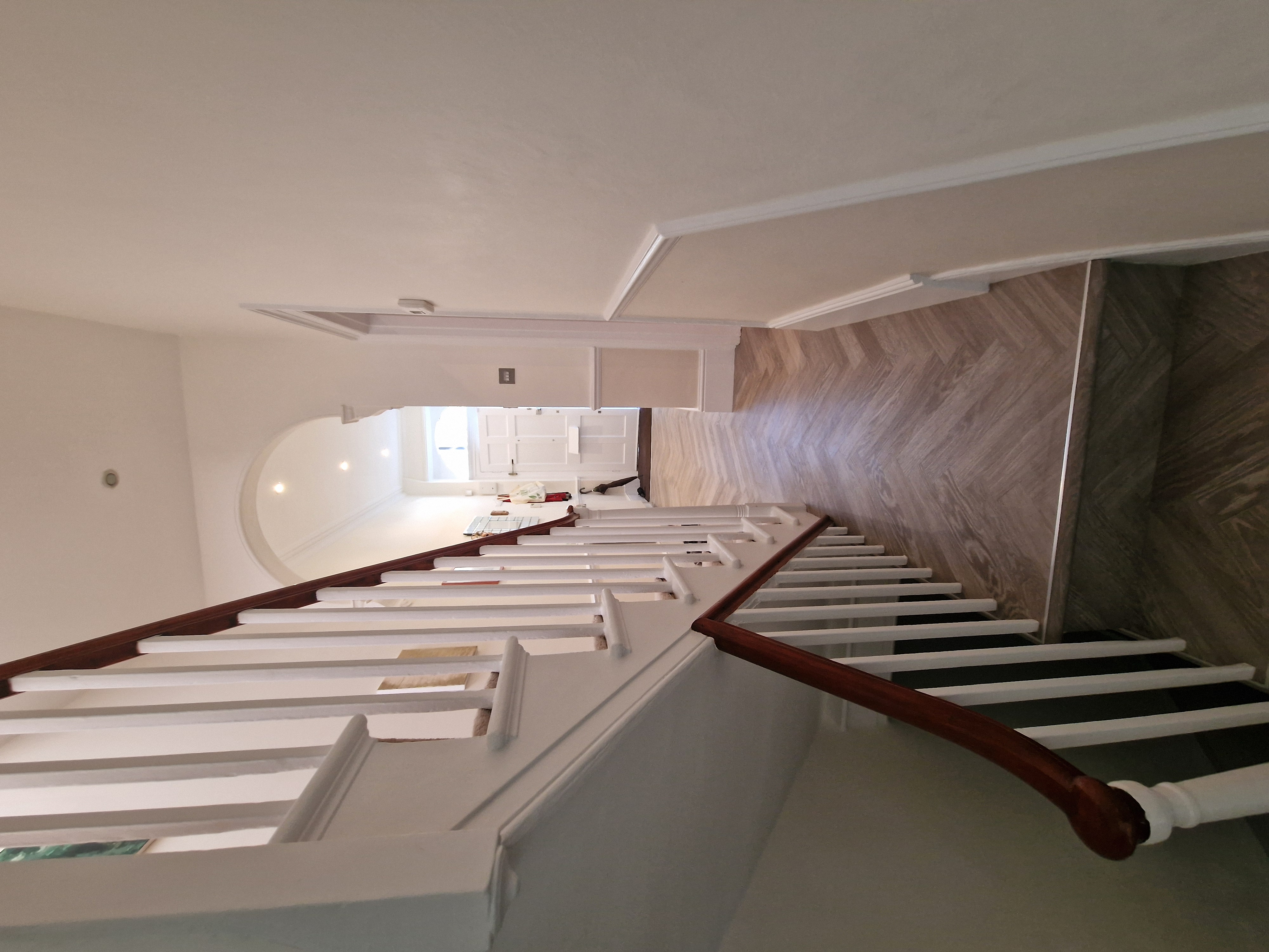 Four-storey hall, stairs and landings renovation with full decoration, and LVT herringbone flooring by LCR Projects
