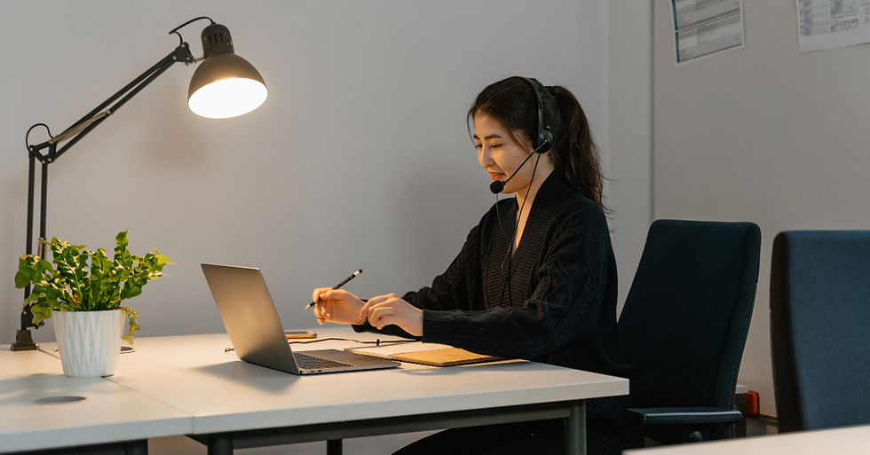 a customer service staff working on her desk.
