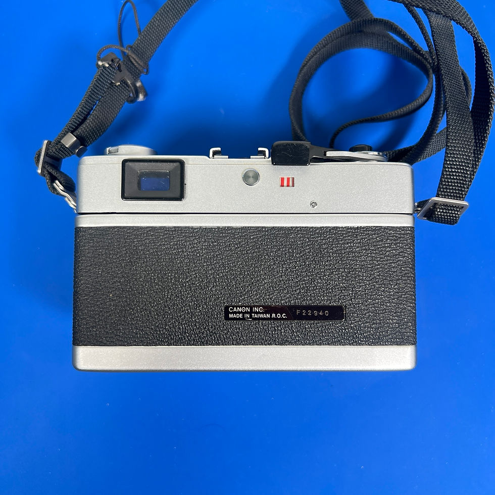 Thumbnail: Canon Canonet 28 rear view with viewfinder and strap