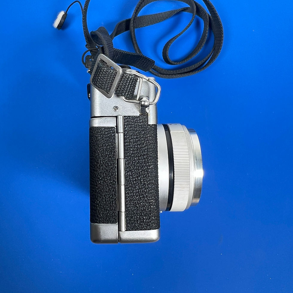 Thumbnail: Canon Canonet 28 side view and fixed 40mm f/2.8 lens