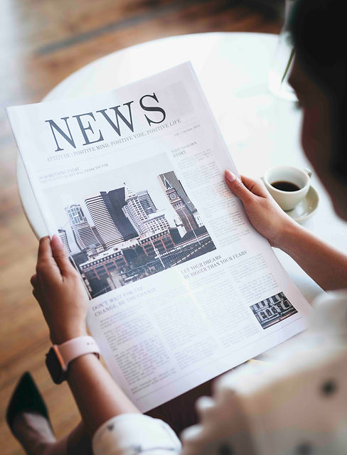woman-reading-a-newspaper-2023-11-27-05-25-42-utc.jpeg