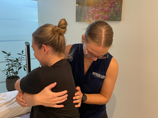 Osteopath treating thoracic spine