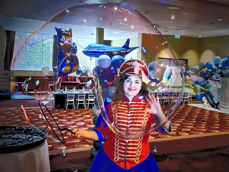 Here's a snapshot of our vibrant Red Ringmaster costume, ready to bring circus fun straight to your party. Inspired by the excitement of London's top-tier events, our services promise to make every celebration unforgettable, whether it's a grand affair at a 5-star hotel or a cosy gathering at home.