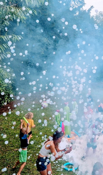 Foam party with exciting smoke bubbles, hosted by a children's entertainer in Bristol and across the UK.