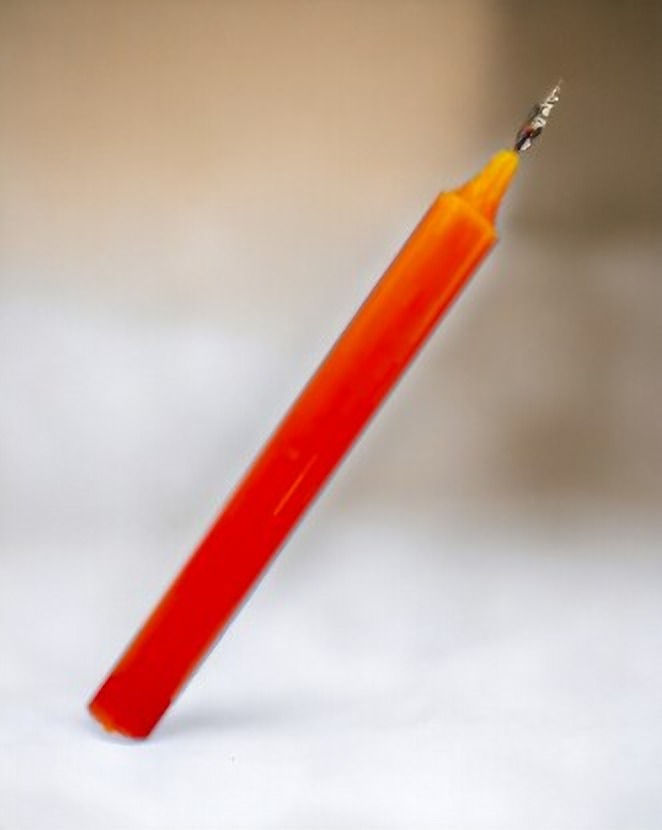 Bougie orange — Chance, réussite et popularité