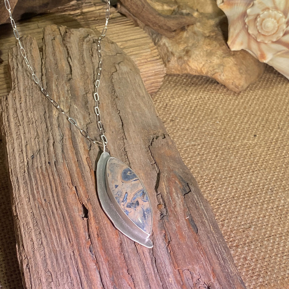 Thumbnail: Fossil Palm Root pendant