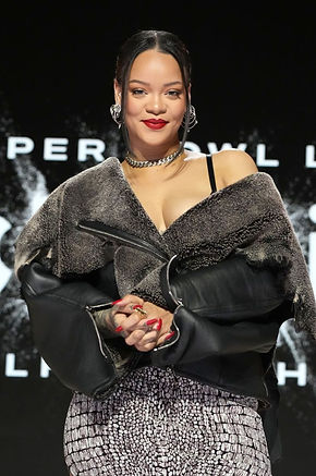 rihanna-poses-onstage-during-the-apple-music-super-bowl-news-photo-1677675675.jpg