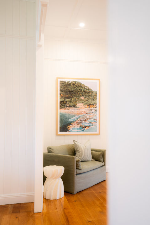 an interior design moment corner of room chair and print Italian photo by Haus of Gray Interior Design