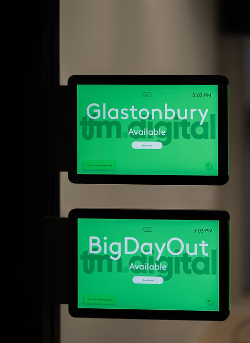 glastonbury and big day out sign in tfm digital office design by haus of gray