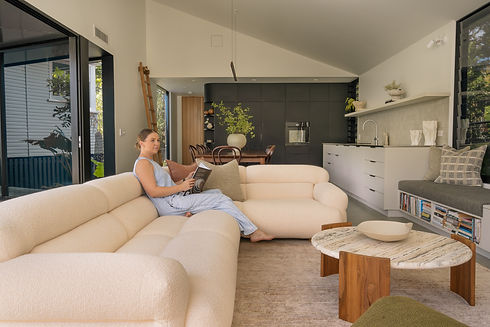 Shanty from Haus of Gray sitting on a light coloured beige Jardan couch