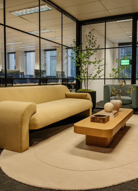 sarah ellison couch and coffee table commercial interior design waiting room