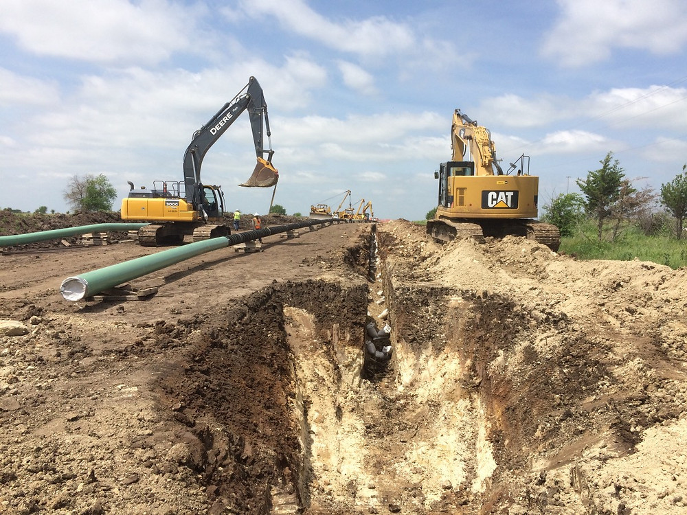 Pipe being gently lain into the ditch Credit: Mothership Aeronautics