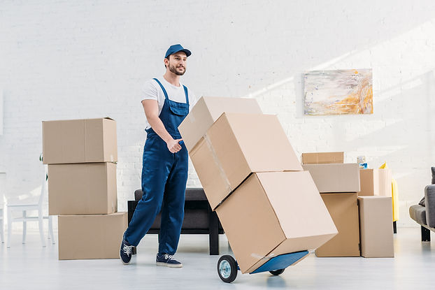 mover-in-uniform-transporting-cardboard-