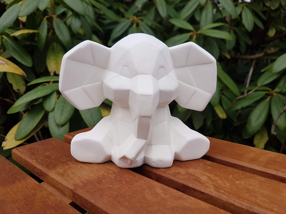 Ceramic bisque facetini elephant figure front view