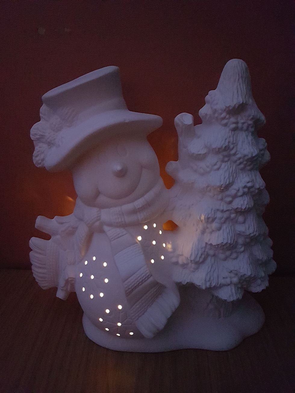 Thumbnail: Ceramic snowman & Christmas tree figure lit up with LED tealight