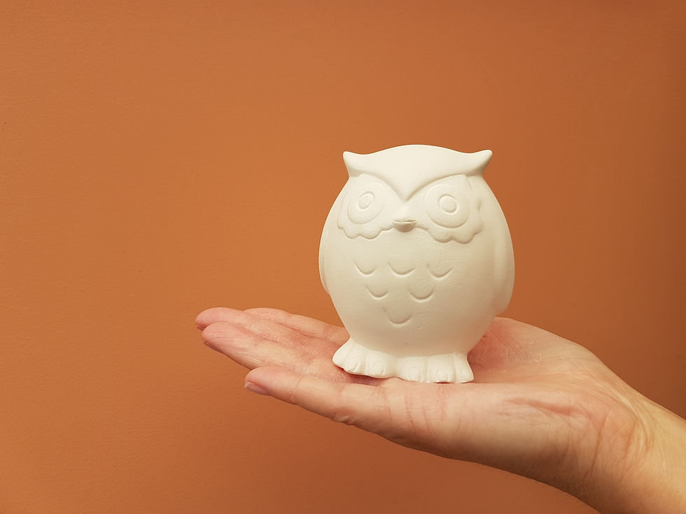 Thumbnail: Ceramic round owl figure in hand for scale