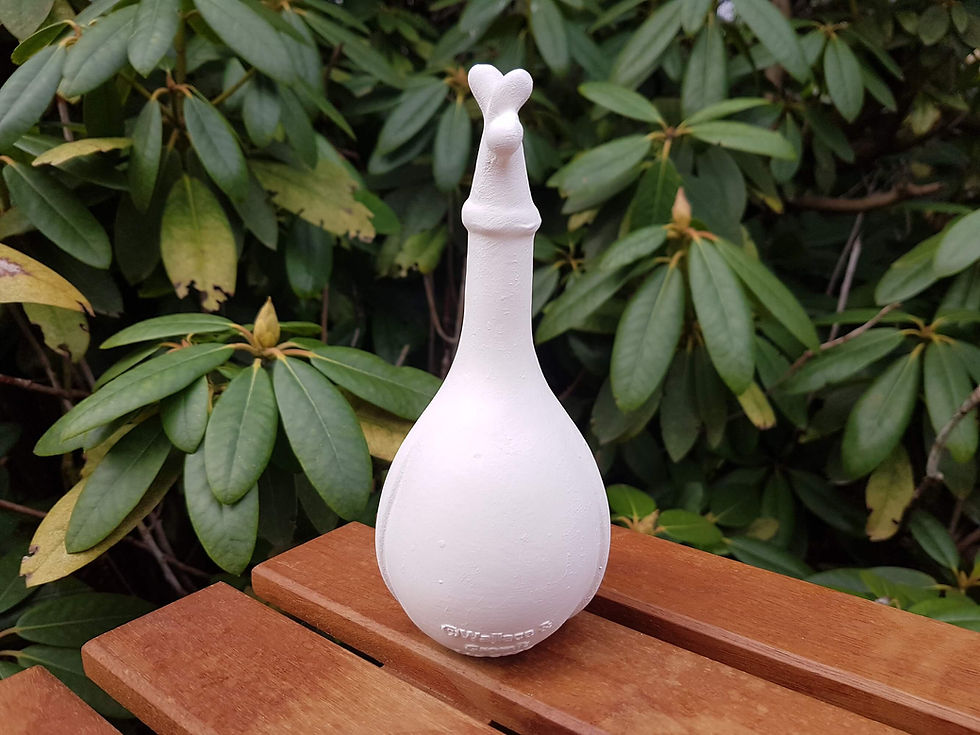 Thumbnail: Ceramic bisque Feathers McGraw Character figure back view