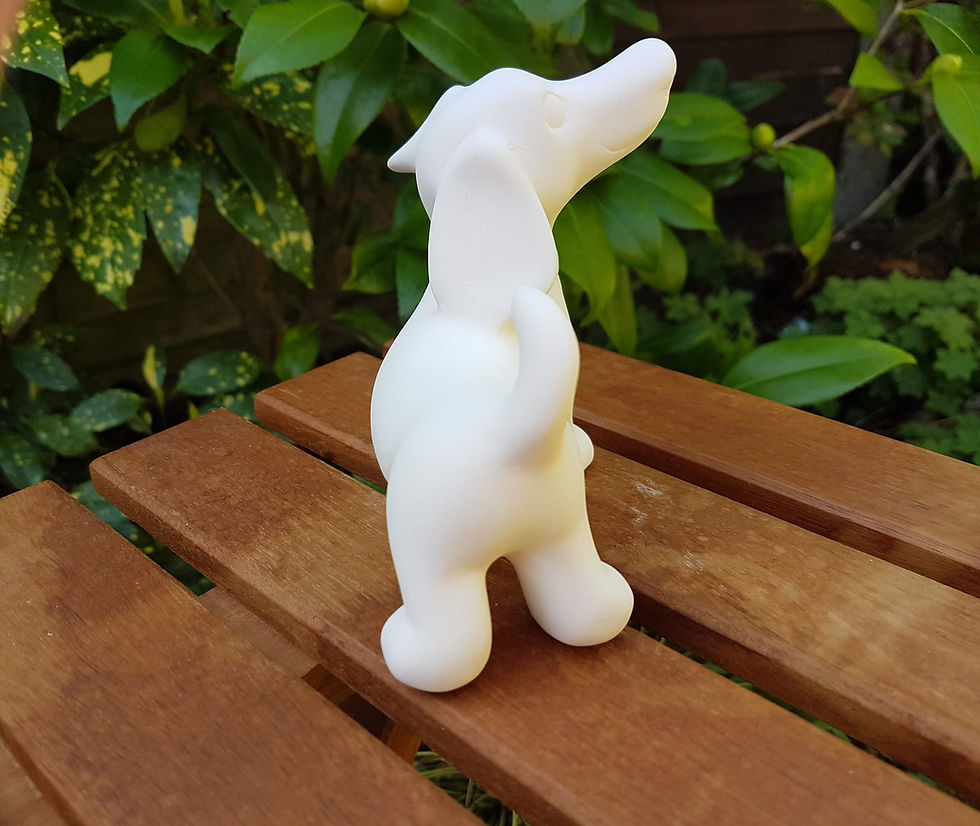 Thumbnail: Ceramic bisque standing dachshund figure left side view
