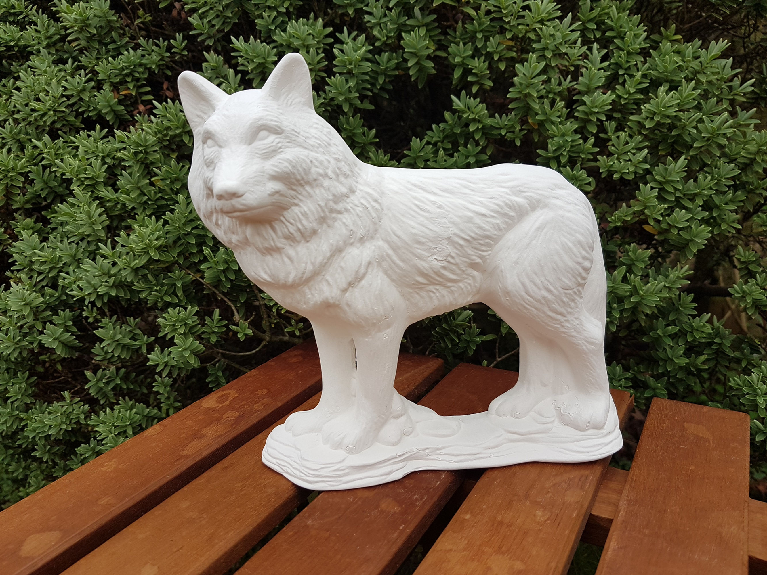 Standing wolf ceramic figure front view