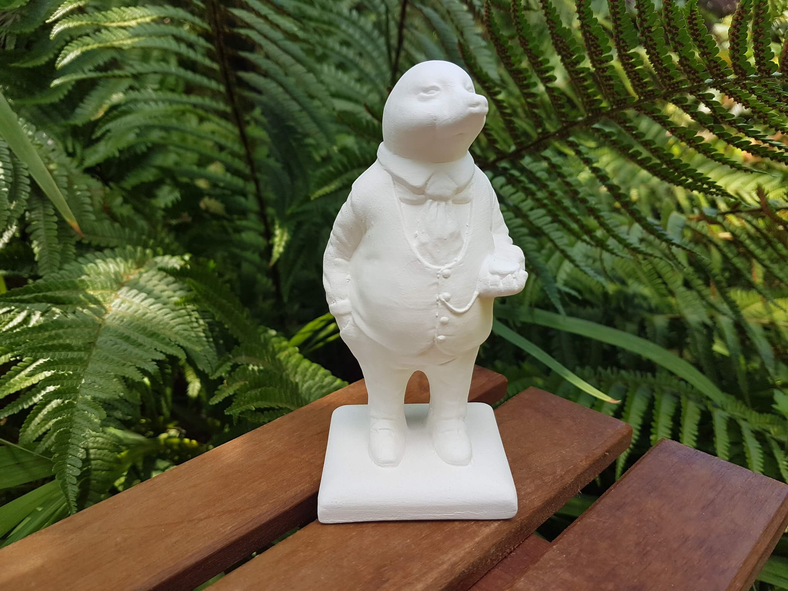 Ceramic bisque Wind in the Willows Mole sculpture trail figure front view