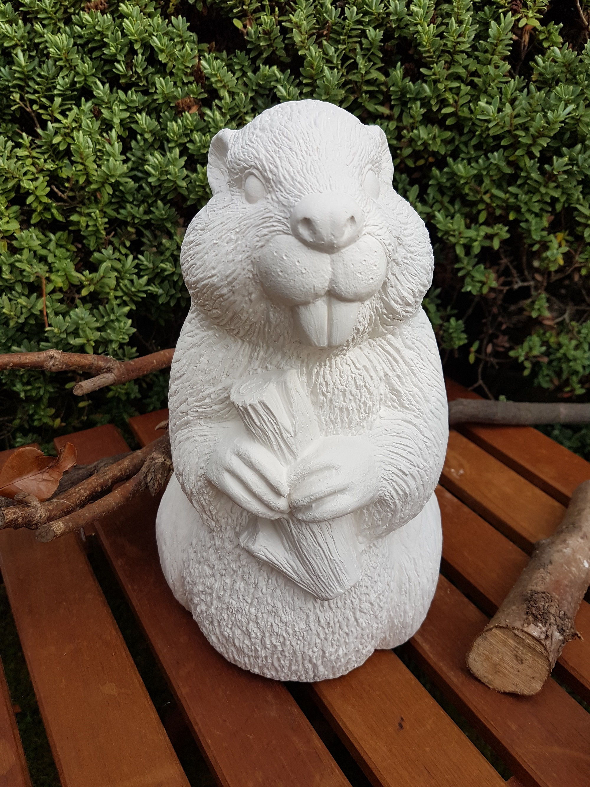 Large Beaver ceramic bisque figure front view with sticks