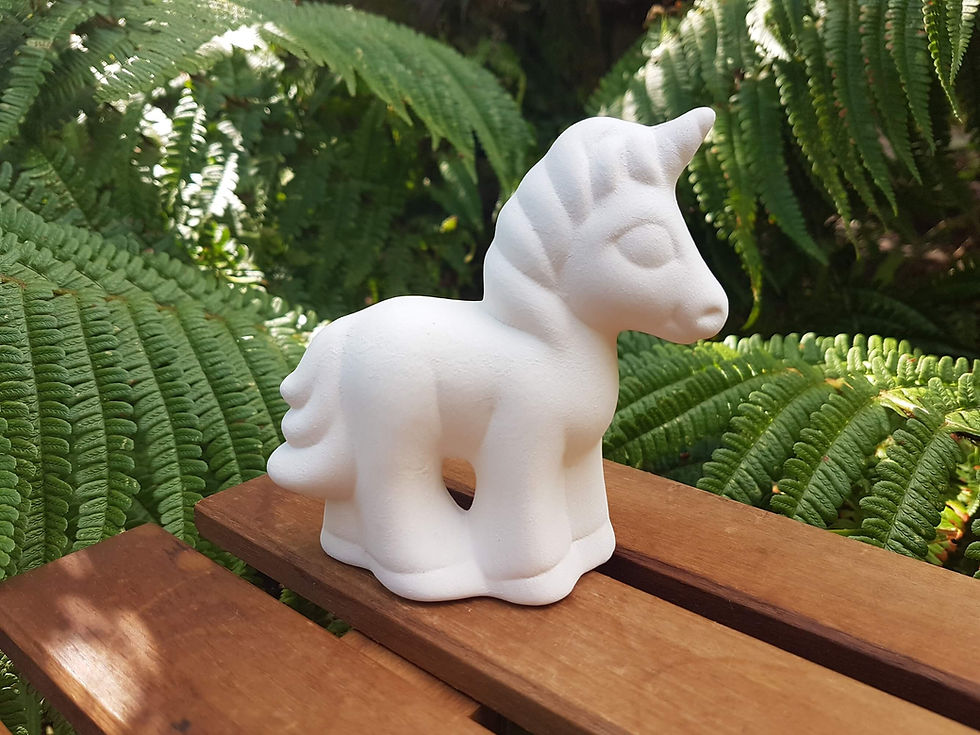 Ceramic bisque unicorn figure right side view