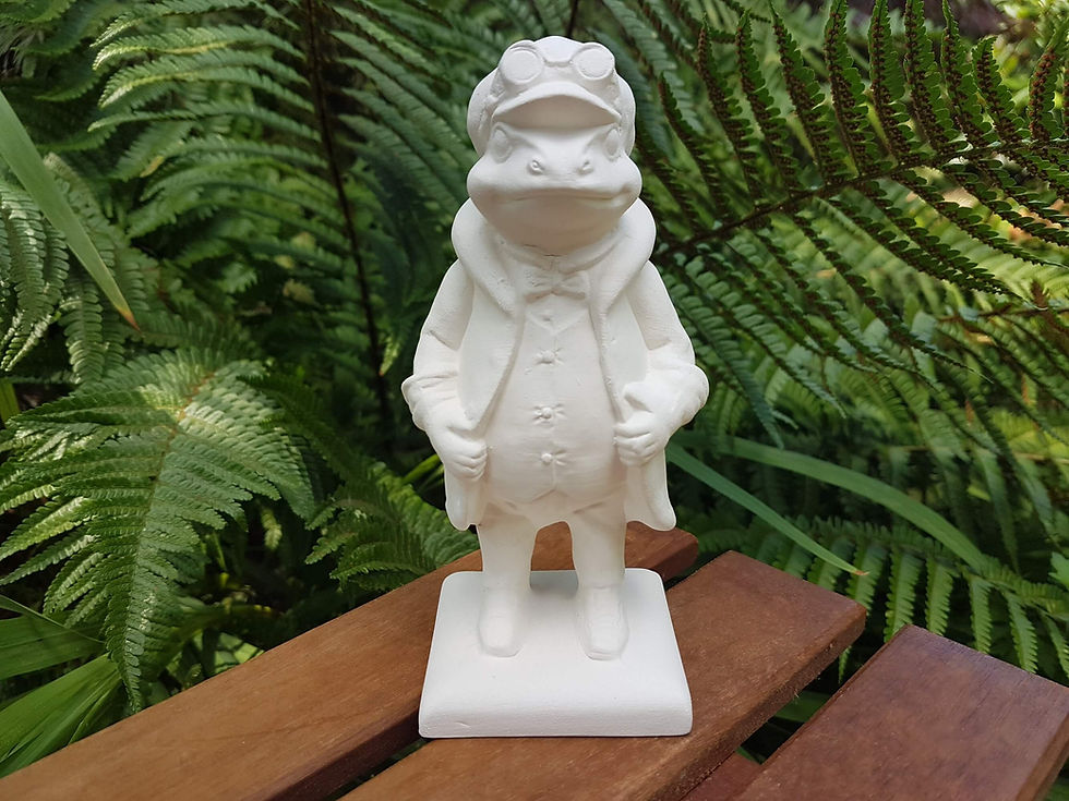 Ceramic bisque Wind in the Willows Toad sculpture trail figure front view