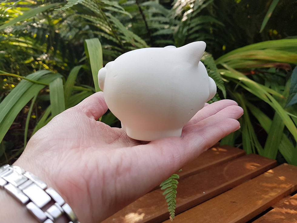 Thumbnail: Pig ceramic figure in hand for scale