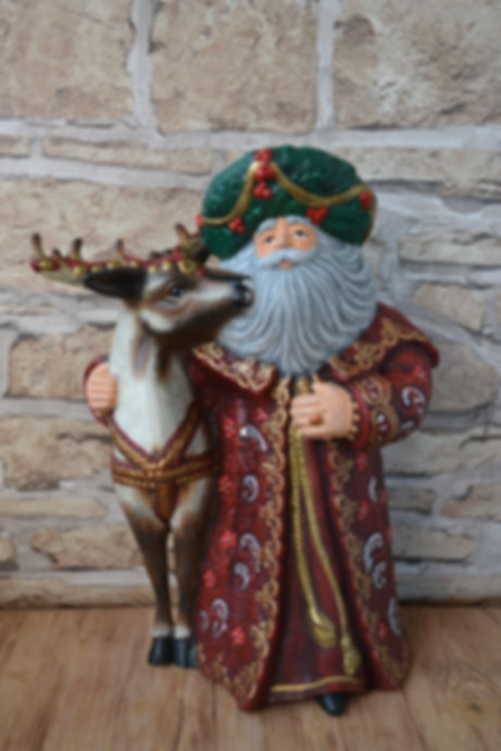 Hand painted ceramic traditional Santa & reindeer figure front view