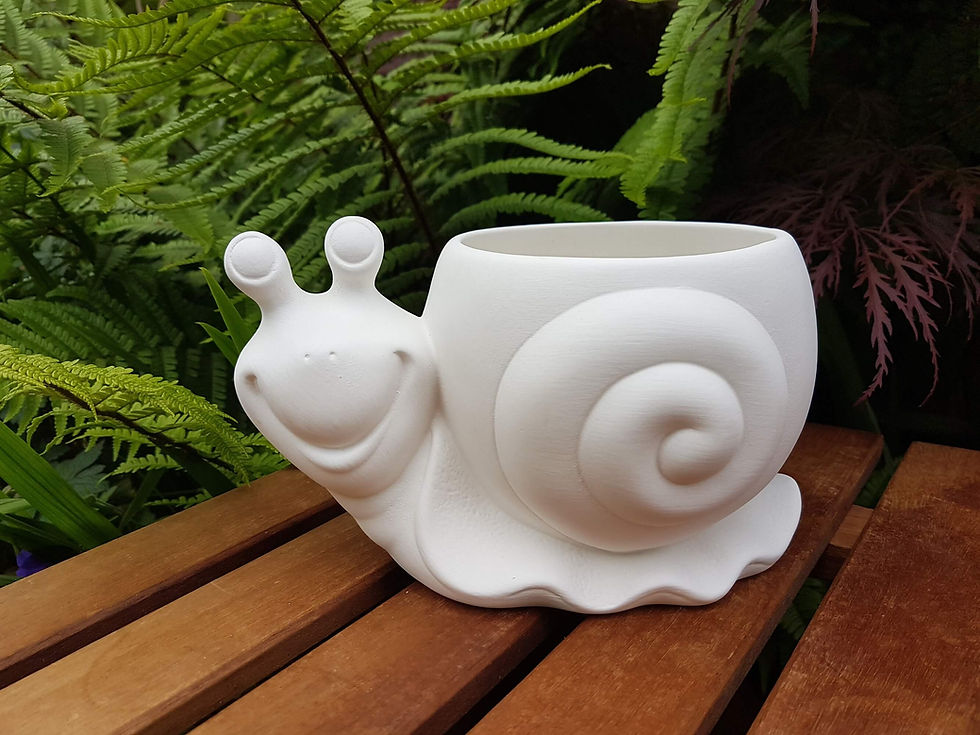 Ceramic bisque snail shaped planter front view