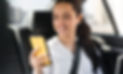 passenger-using-her-mobile-phone-car.jpg