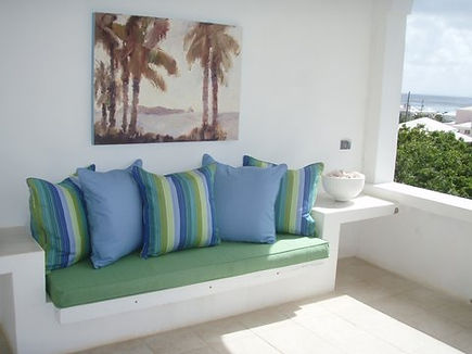 Custom blue and green cushions and pillows by Ocean Tailors.