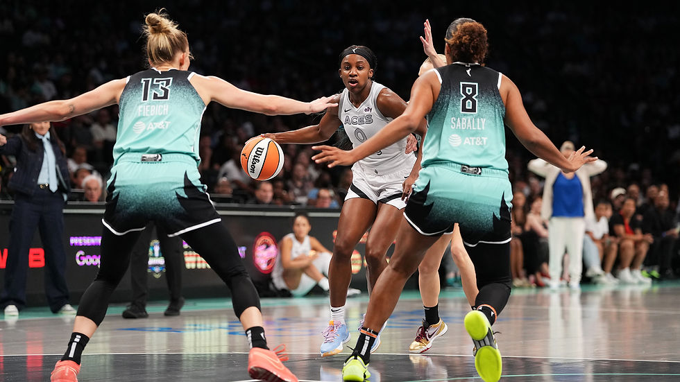Las Vegas guard Jackie Young looks to make a move against the New York defense. Photo Credit: Las Vegas Aces