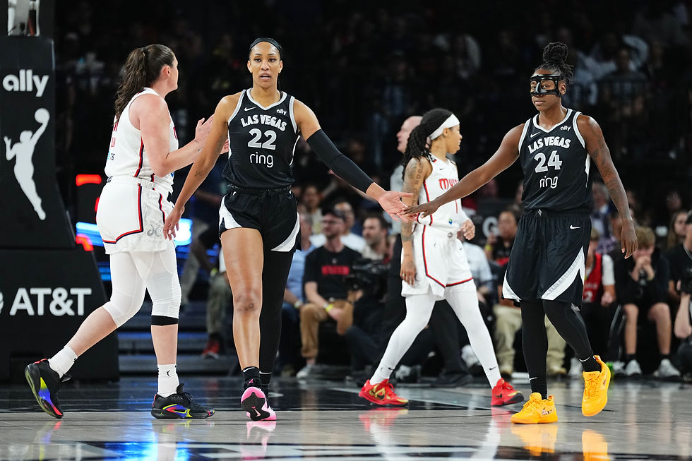 Las Vegas' A'ja Wilson slaps five with hands during a home game against Washington inside Michelob Ultra Arena. Photo Credit: Las Vegas Aces