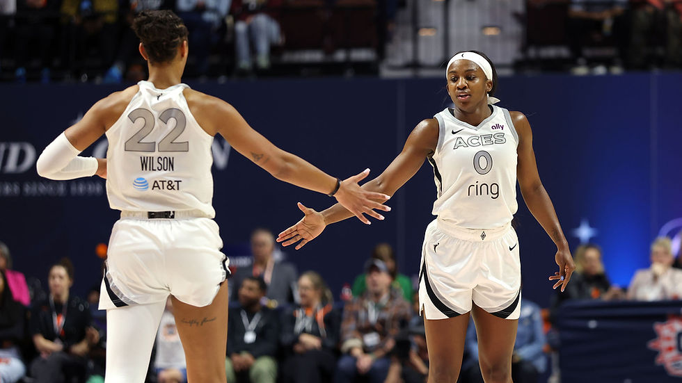 Las Vegas players A'ja Wilson (#22) and Jackie Young (#0) acknowledge each other during the team's road win against Connecticut. Photo Credit: Las Vegas Aces