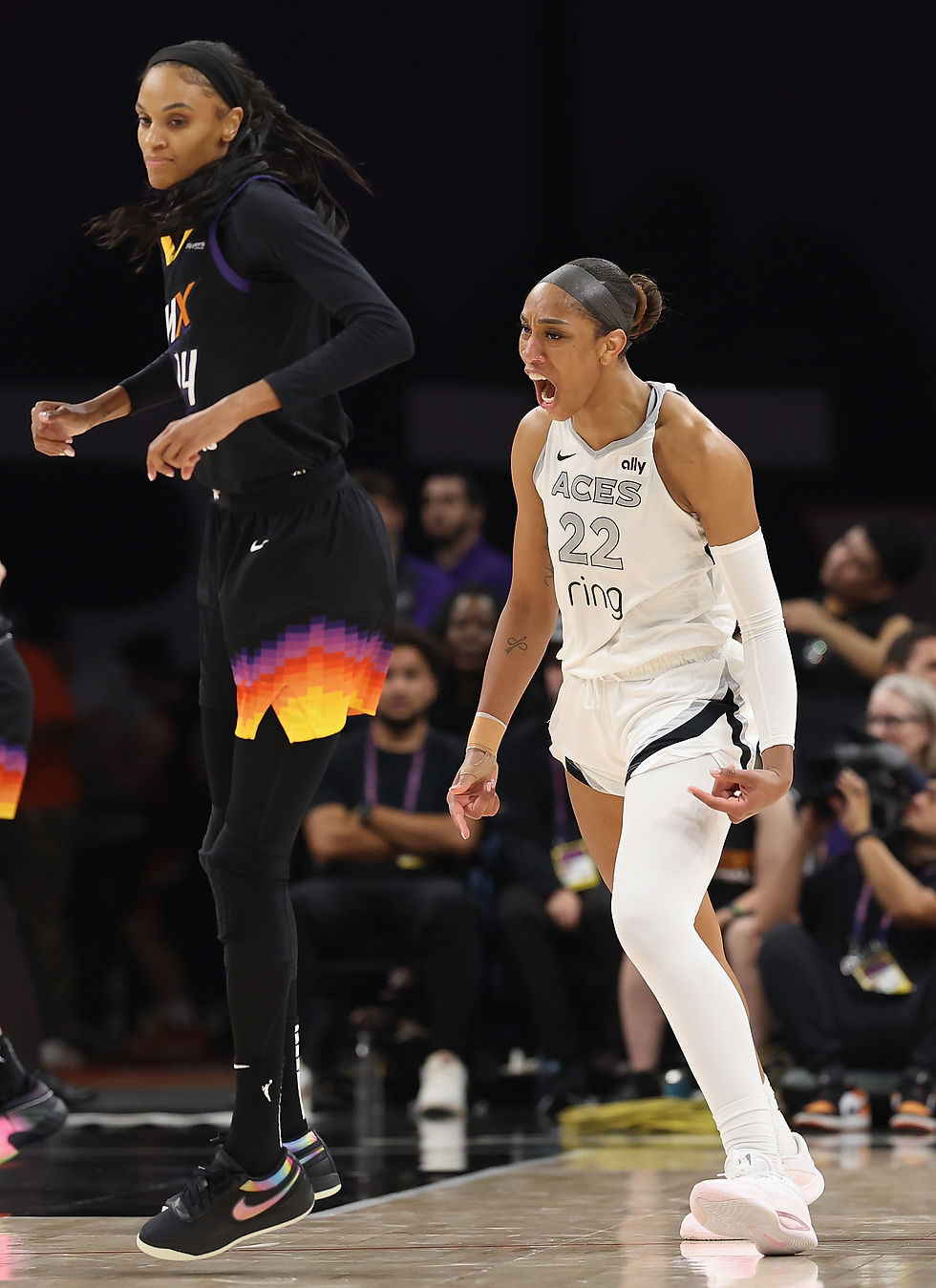 Aces forward A'ja Wilson reacts after hitting a jumper over Mercury forward DeWanna Bonner. Photo Credit: Las Vegas Aces